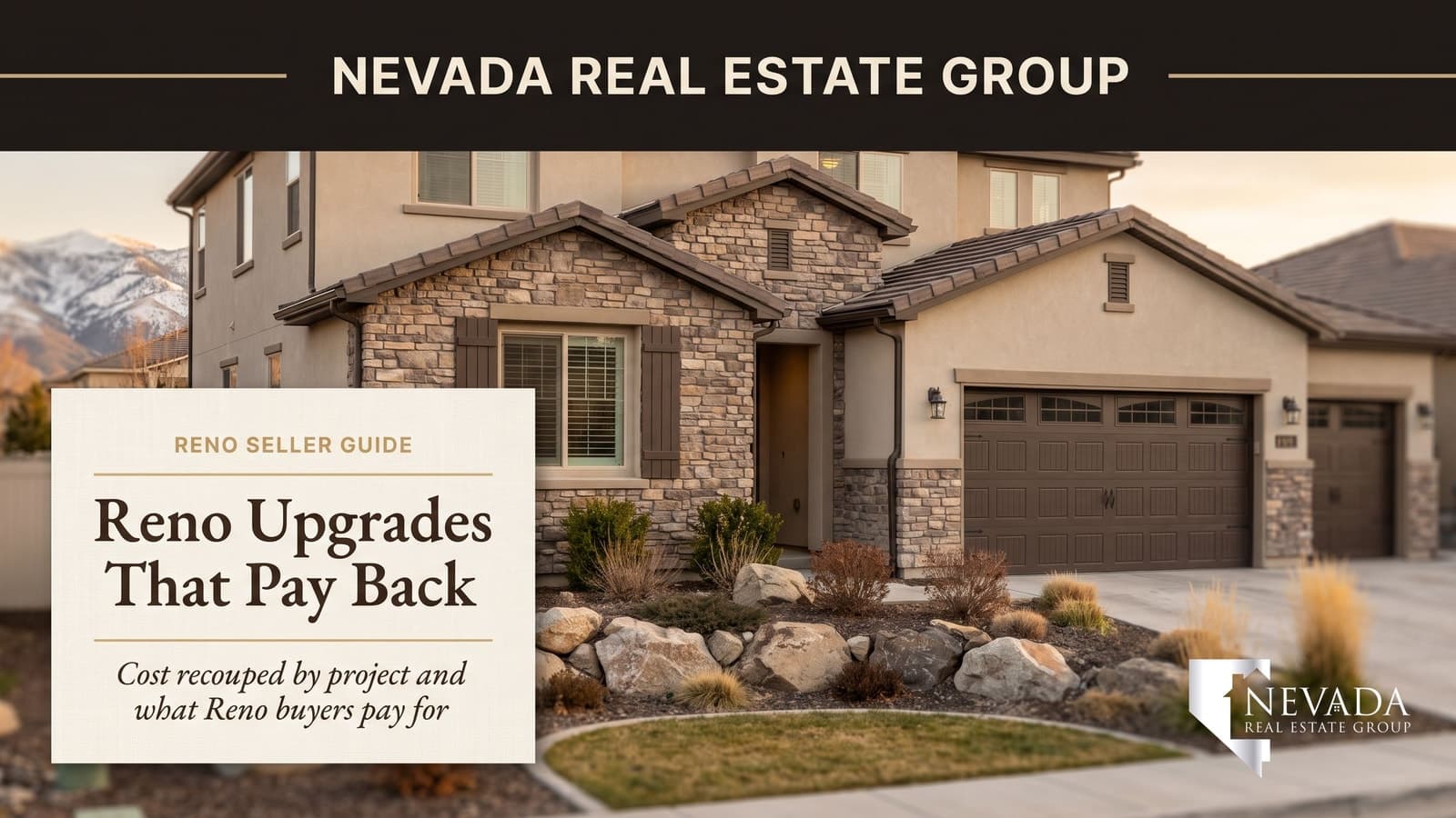 Two-story Reno stucco and stone-veneer home with a carriage-style garage door and a water-wise front yard below snow-dusted Sierra Nevada peaks