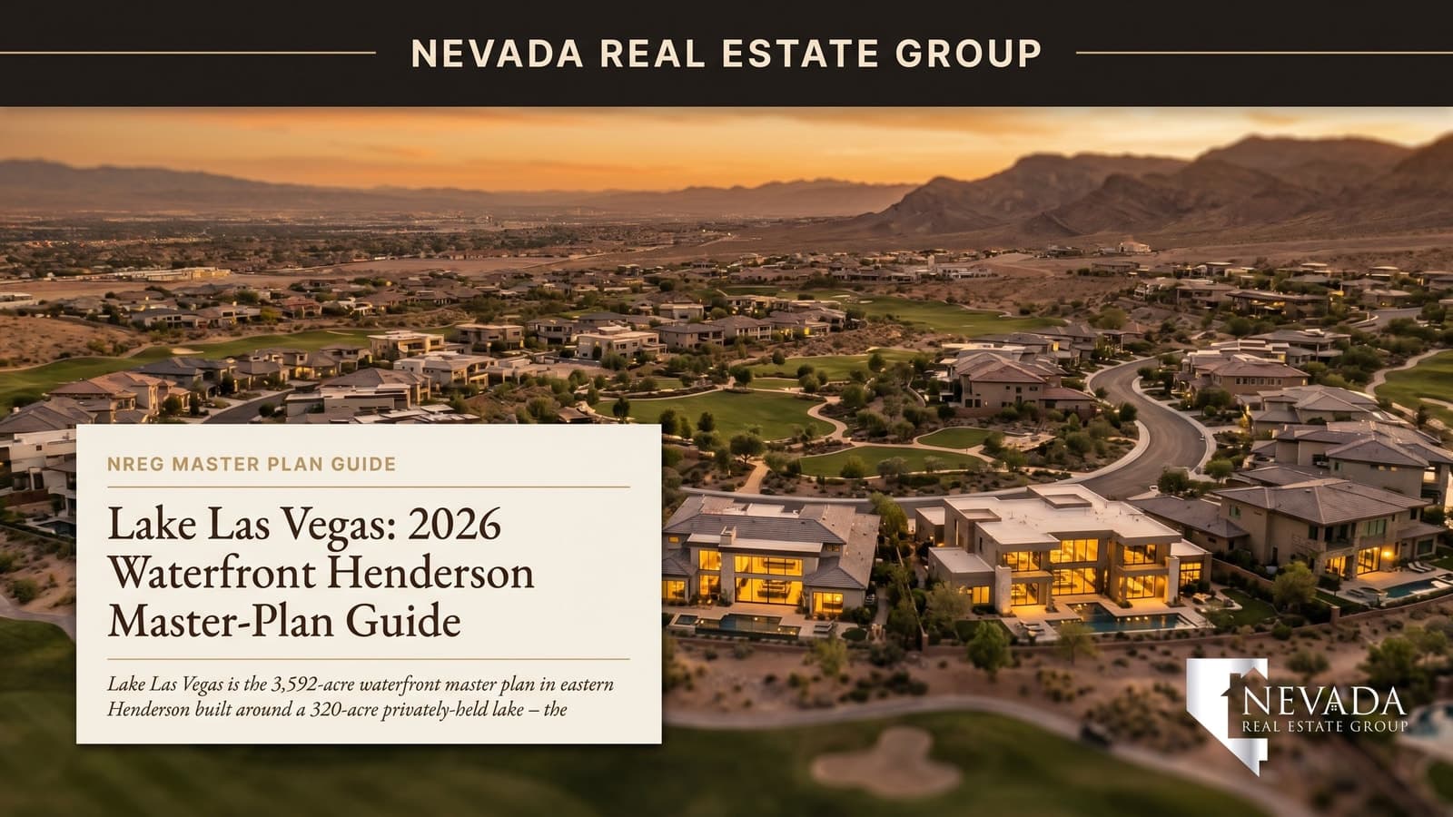 Lake Las Vegas Henderson waterfront aerial at golden hour with private 320-acre lake, lakefront estates, and the Hilton resort tower in the distance