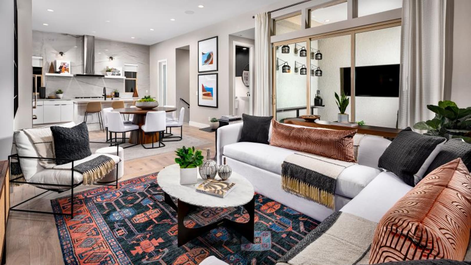 Representative great room and casual dining space illustrating open concept flow
