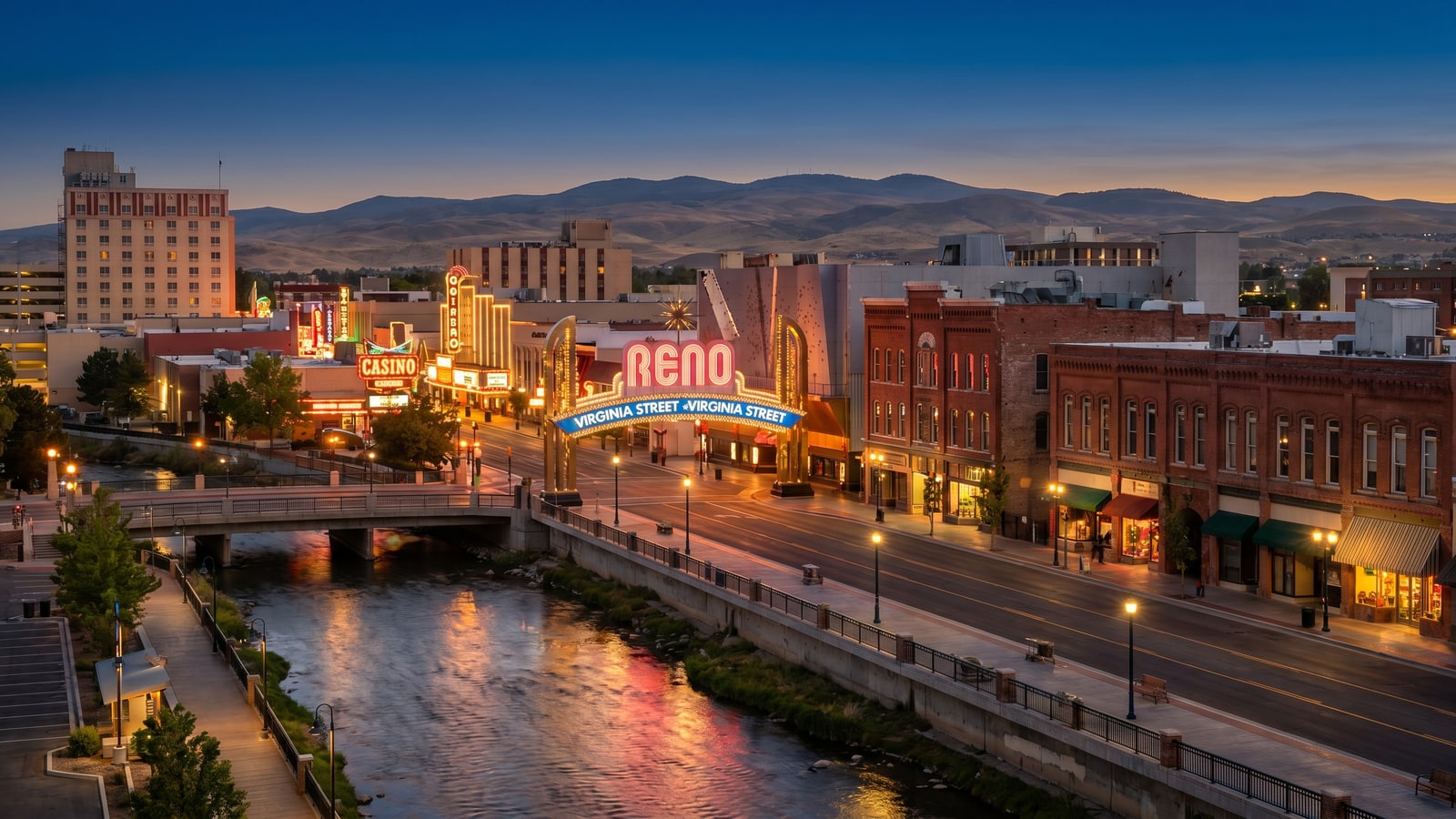 Downtown Reno, Nevada at dusk with the lit Reno arch over Virginia Street and the Truckee River riverwalk