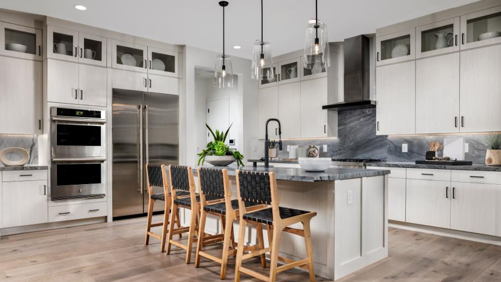 Representative builder image showing an interior kitchen island layout for the Bello design at Elkhorn Grove