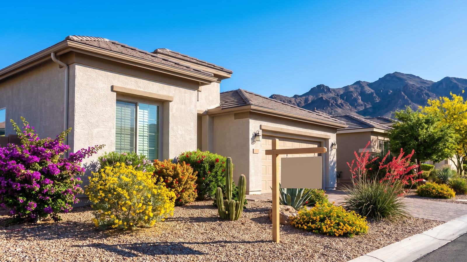 For-sale sign in front of a Henderson Nevada home with desert landscaping and Black Mountain in the background on a sunny day