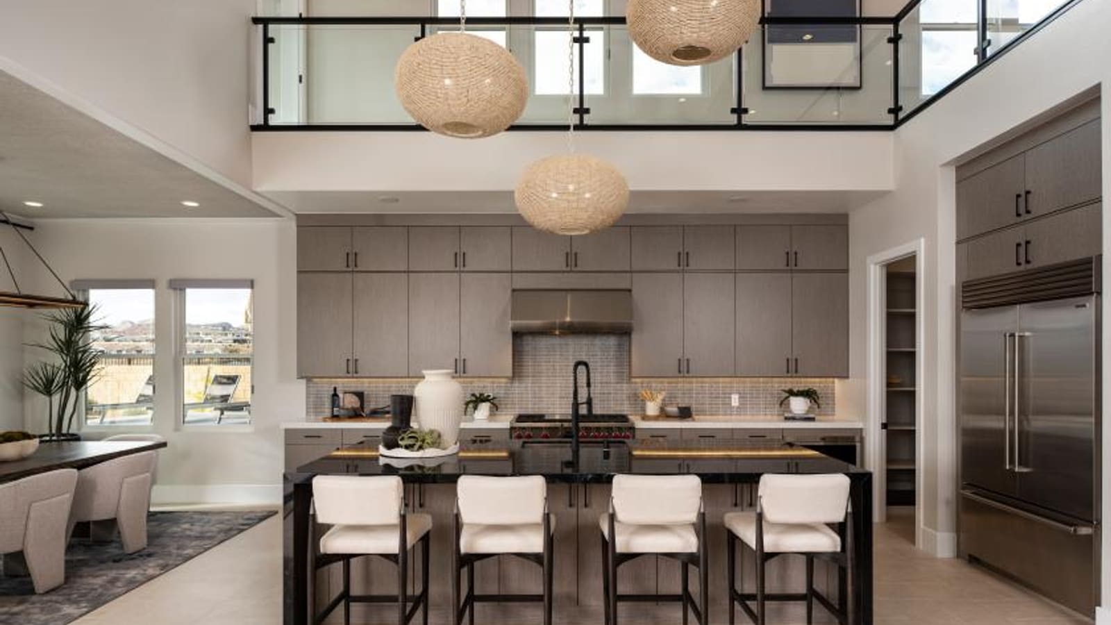 Representative builder image showing kitchen cabinetry and center island