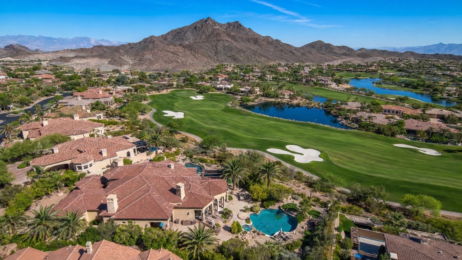 Anthem Country Club golf course fairway with Henderson custom homes and mountain backdrop