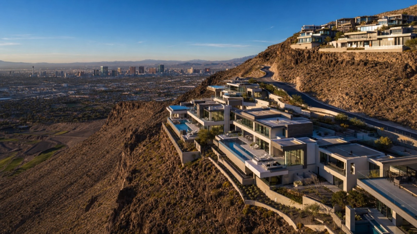 Henderson Nevada guard-gated community aerial showing residential development and mountain backdrop — job growth driving housing demand 2026