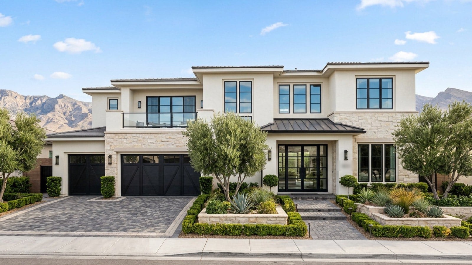 Illustration of a modern two-story stucco and stone home with black garage doors, olive trees and desert mountains behind it