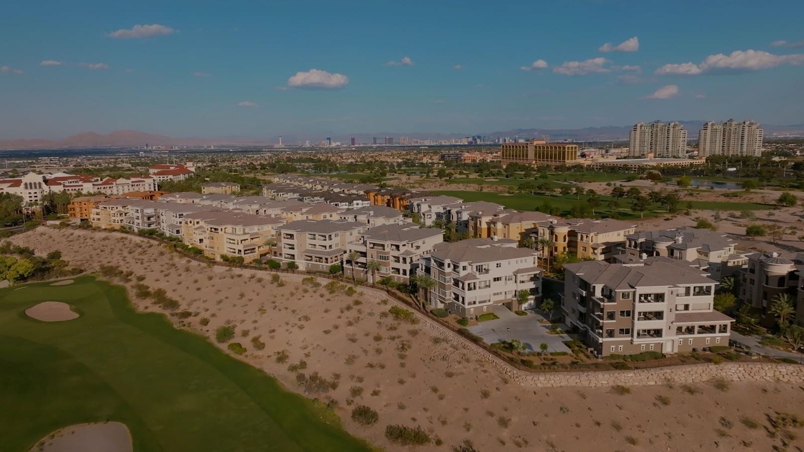 Representative builder image showing mid-rise exterior architecture and community landscaping