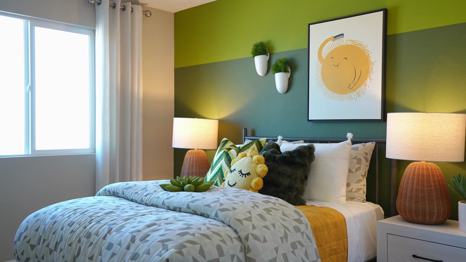 Secondary bedroom in the Pulte Branton model at Dalea at Aries with a green accent wall, a queen bed and a large window