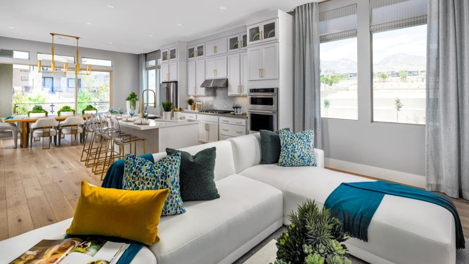 Representative builder image of a secondary living space with seating and large windows