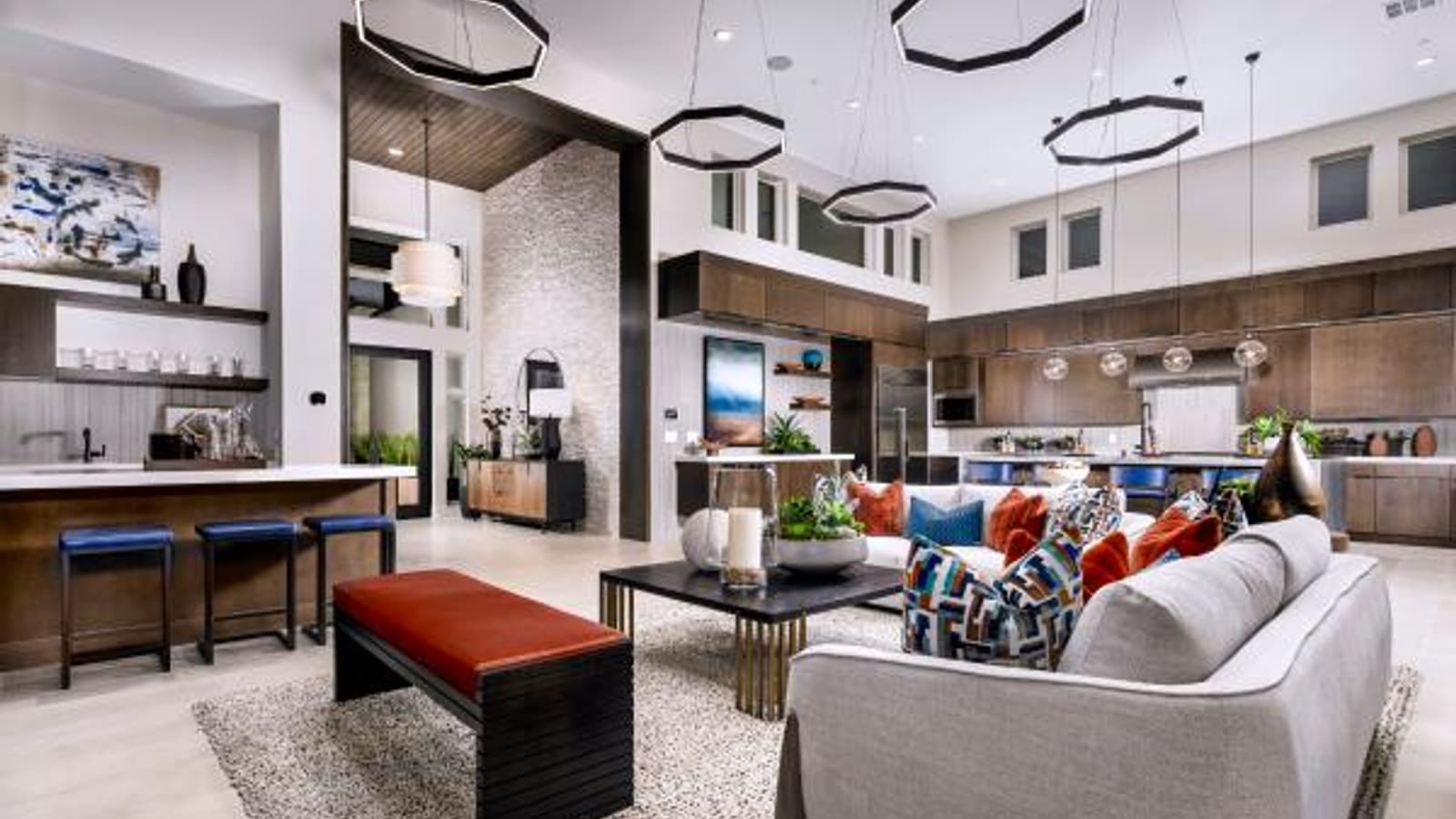 Open concept living area transitioning smoothly into a modern gourmet kitchen