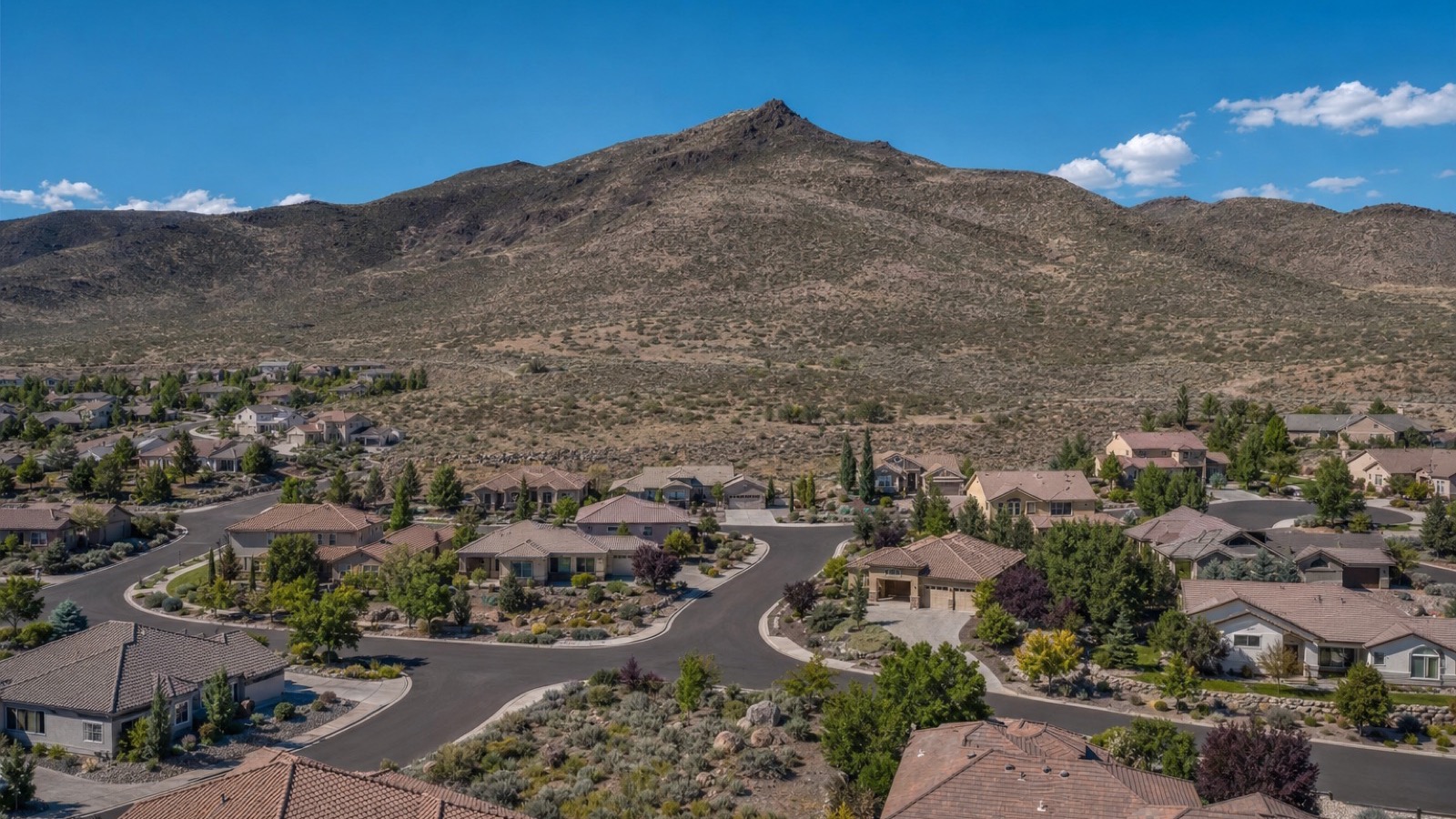 Aerial view of the Peavine Mountain foothills above northwest Reno, Nevada showing building lots at the edge of the developed area