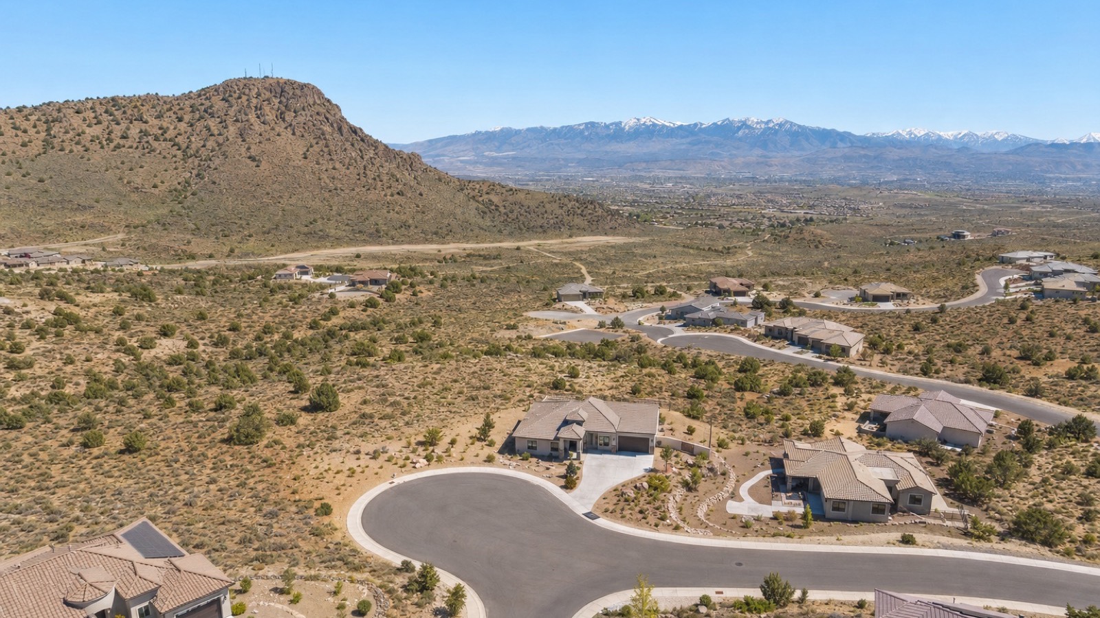Aerial view of large vacant parcels in the North Valleys above Reno, Nevada, the area where forty-acre listings sell for roughly three thousand dollars an acre