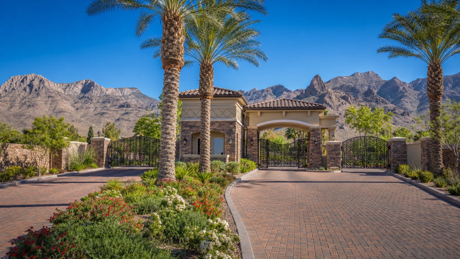 Gated entrance of a Las Vegas 55+ community with desert landscaping, one of the valley's age-restricted neighborhoods