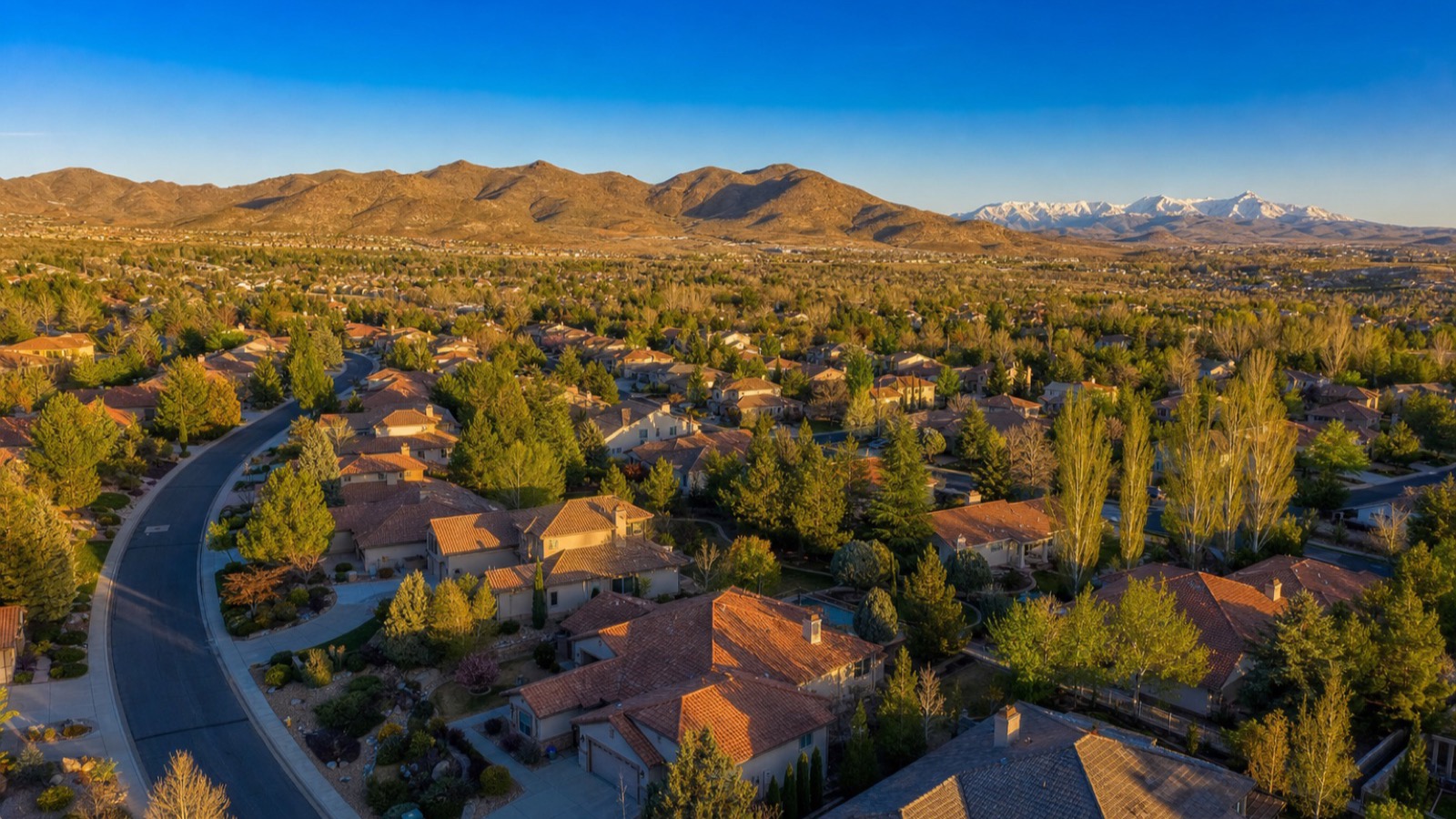 Aerial view of Spanish Springs in Sparks Nevada showing master-planned residential development against the valley edge
