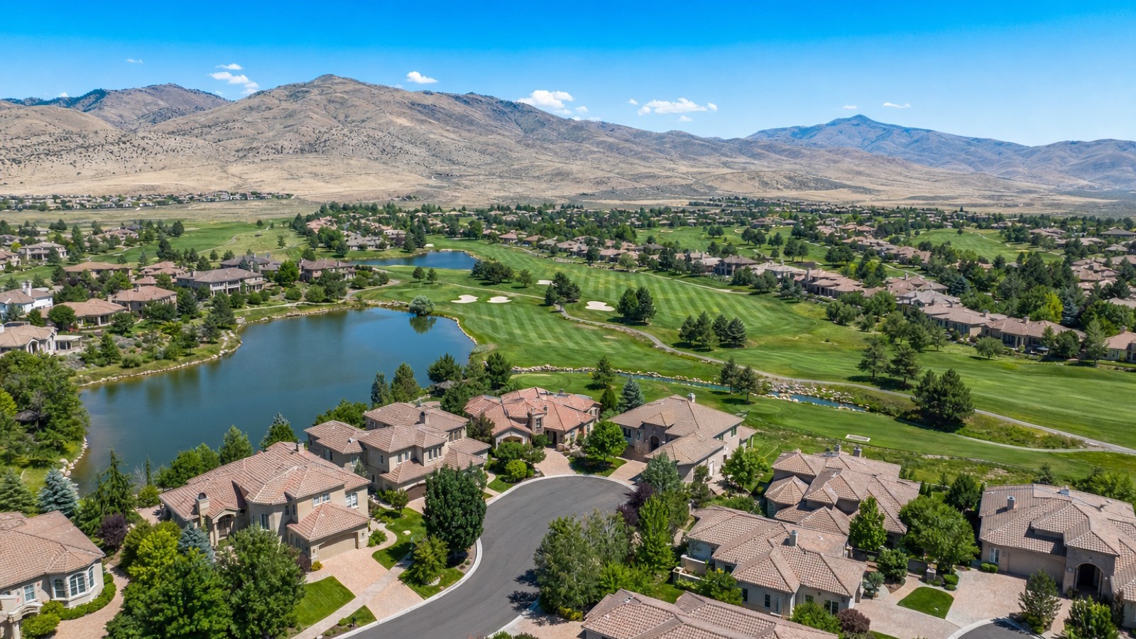 Aerial view of Wingfield Springs in Sparks Nevada with golf course frontage and master-planned residential streets