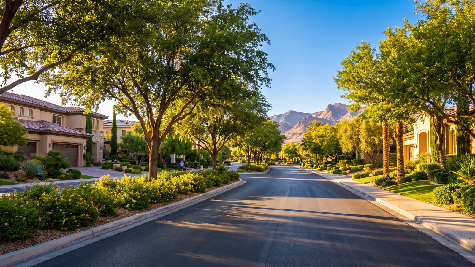 Tree-lined Summerlin street with upscale homes and mountain backdrop, ranked best Las Vegas suburb 2026