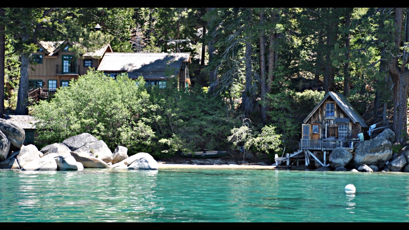 Snow-covered shoreline homes at Lake Tahoe Nevada in winter