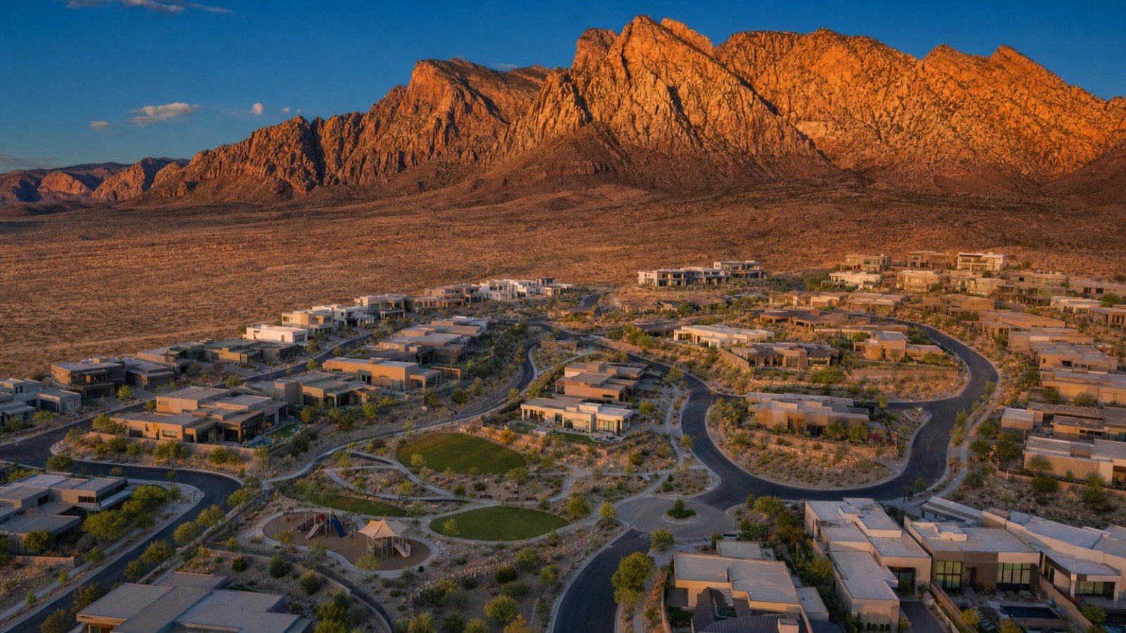 Aerial view of Summerlin's Cliffs village with single-story homes on the hillside, where Regency by Toll Brothers sits behind its guard gate