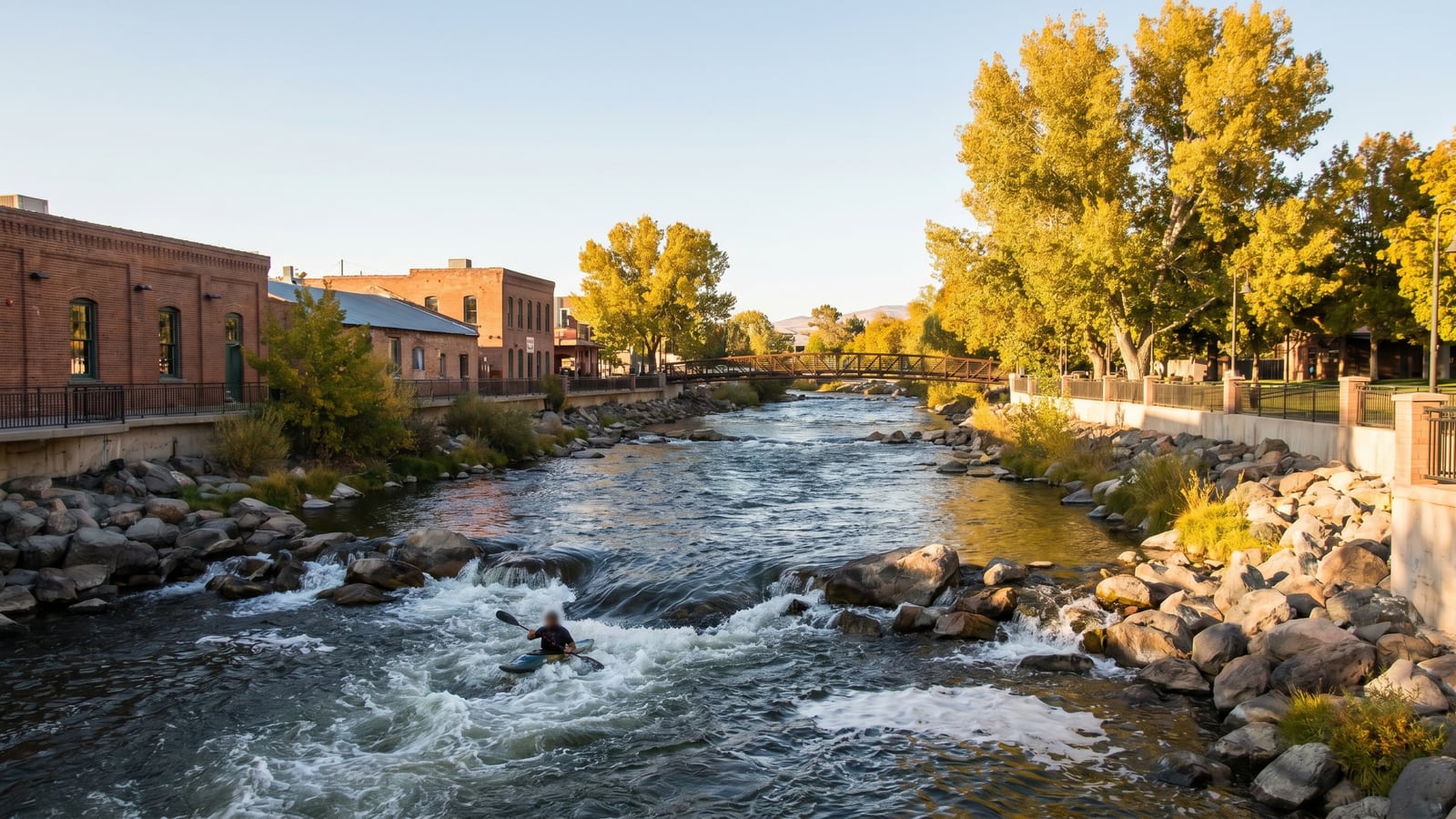 The Truckee River flowing through downtown Reno, Nevada with the riverwalk and whitewater park